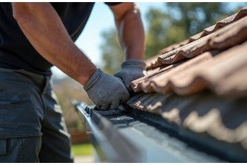 Expert technician providing gutter guards installation services