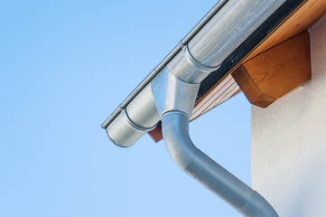 professional gutter services installation on residential home